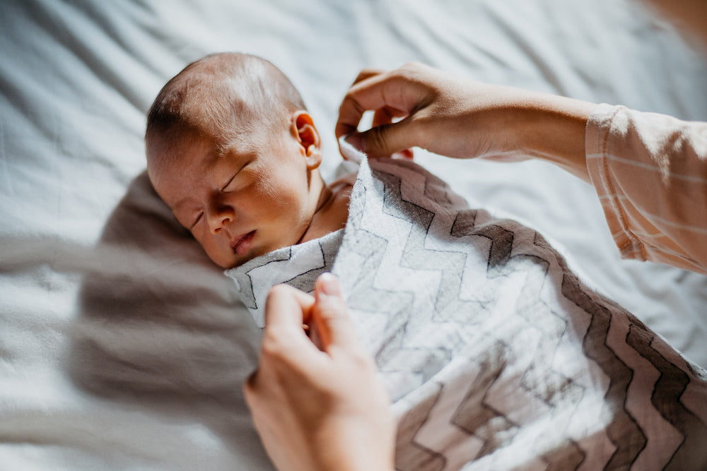  Swaddling a newborn 